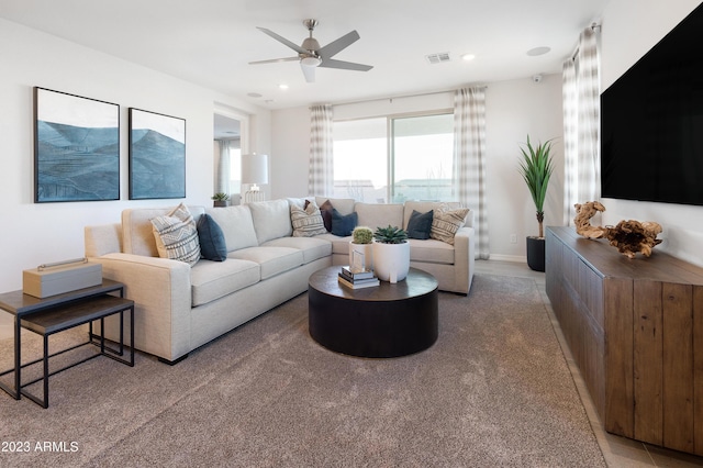 living room featuring ceiling fan