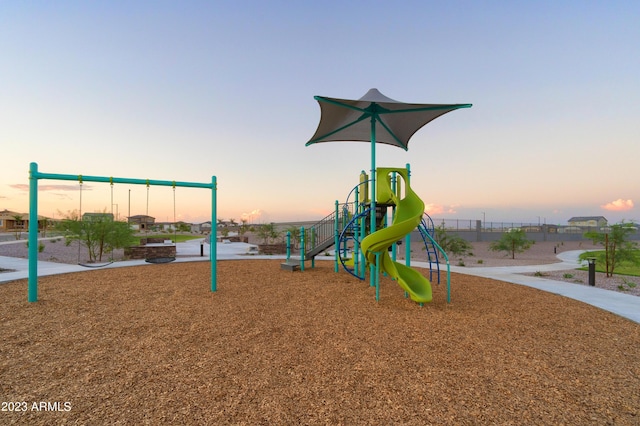 view of playground at dusk