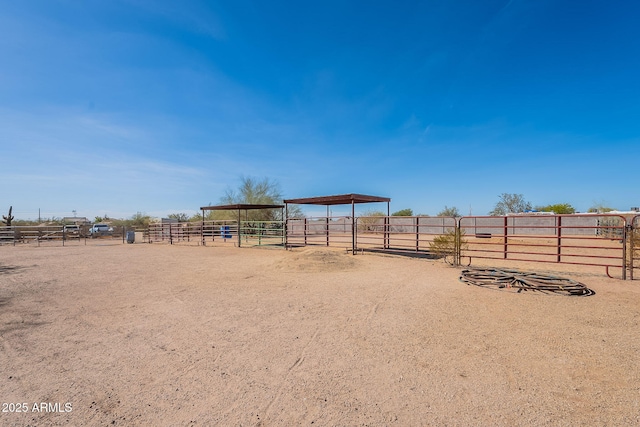 532 N 102nd Pl, Mesa, AZ 85207 - view of yard featuring an exterior structure, an outbuilding, and a view of rural / pastoral area