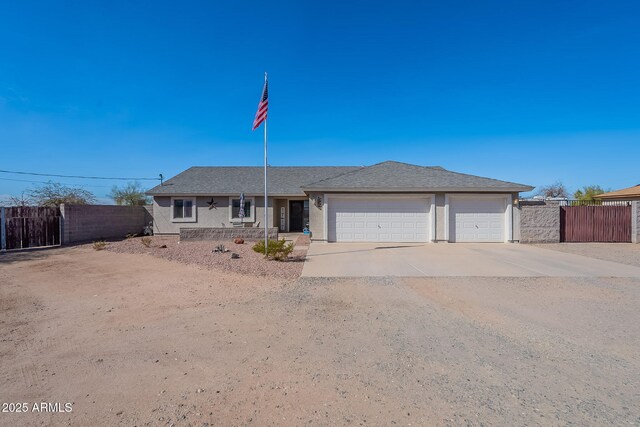532 N 102nd Pl, Mesa, AZ 85207 - ranch-style house featuring an attached garage, driveway, and stucco siding