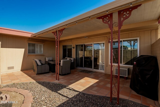 view of patio featuring visible vents, an outdoor living space, and area for grilling