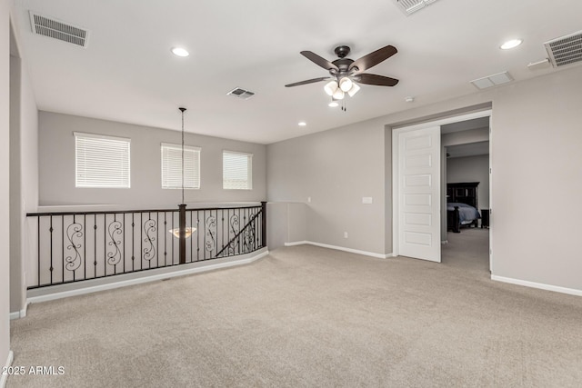 14727 W Pasadena Ave, Litchfield Park, AZ 85340 - carpeted spare room featuring a ceiling fan, baseboards, and recessed lighting