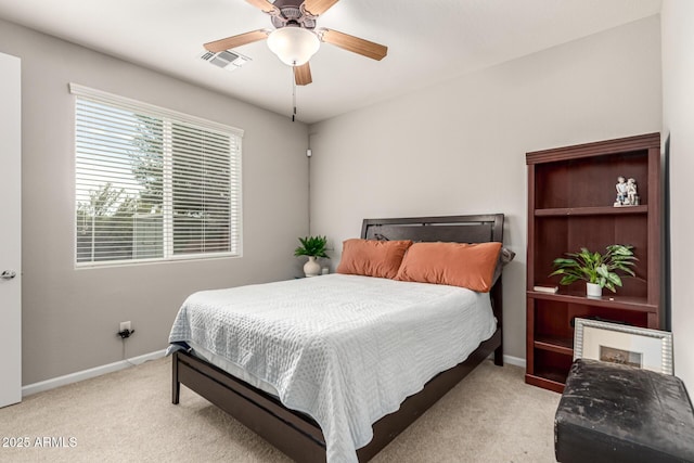 14727 W Pasadena Ave, Litchfield Park, AZ 85340 - bedroom with carpet flooring, baseboards, and a ceiling fan