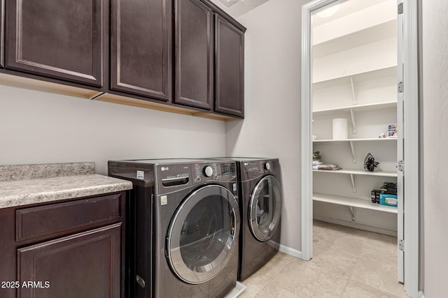 14727 W Pasadena Ave, Litchfield Park, AZ 85340 - laundry room featuring cabinet space, independent washer and dryer, baseboards, and light tile patterned floors