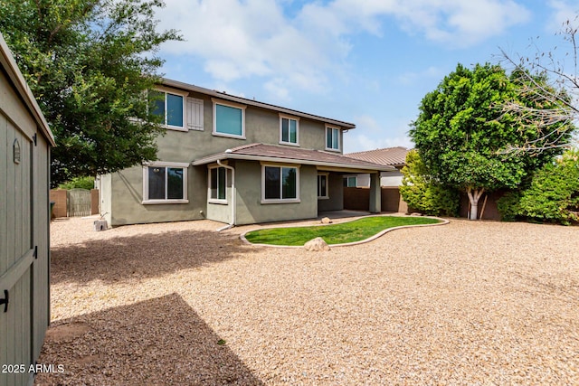 14727 W Pasadena Ave, Litchfield Park, AZ 85340 - rear view of property with stucco siding, a fenced backyard, and a patio area
