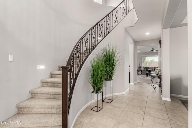14727 W Pasadena Ave, Litchfield Park, AZ 85340 - stairs featuring a ceiling fan, baseboards, and recessed lighting