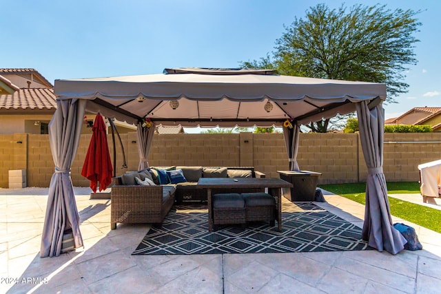 view of patio featuring a gazebo and an outdoor living space