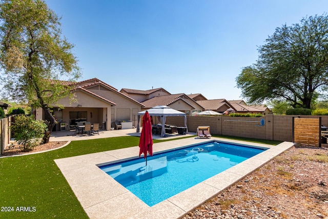 view of swimming pool featuring a patio area