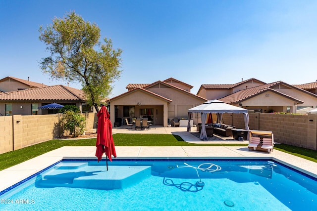 view of swimming pool featuring outdoor lounge area and a patio area