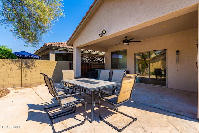 view of patio with ceiling fan