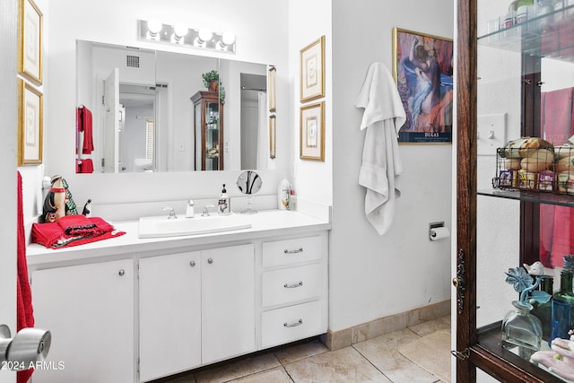 bathroom featuring vanity and tile patterned floors