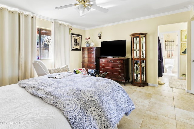 tiled bedroom with connected bathroom, ceiling fan, and ornamental molding