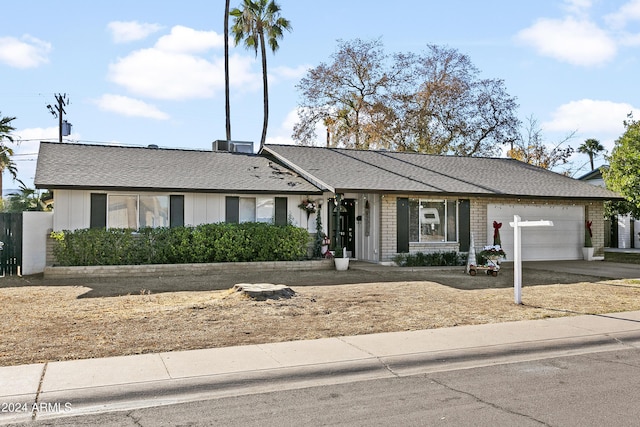 ranch-style home with a garage