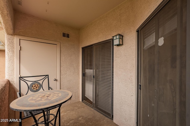 balcony featuring visible vents