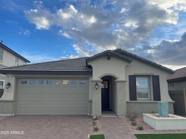 view of front of home with a garage