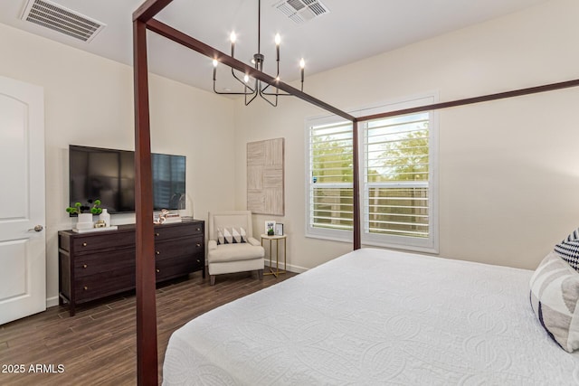 1951 W Plum Rd, Phoenix, AZ 85085 - bedroom featuring a chandelier and dark wood-style flooring