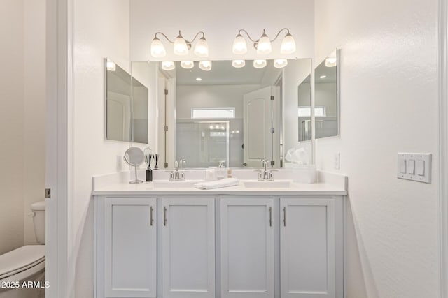 1951 W Plum Rd, Phoenix, AZ 85085 - bathroom featuring double vanity, toilet, and a shower stall
