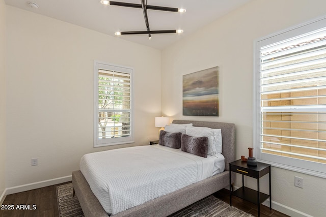 1951 W Plum Rd, Phoenix, AZ 85085 - bedroom featuring dark wood-style floors and baseboards