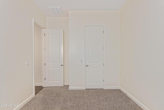 1951 W Plum Rd, Phoenix, AZ 85085 - unfurnished bedroom with carpet and baseboards
