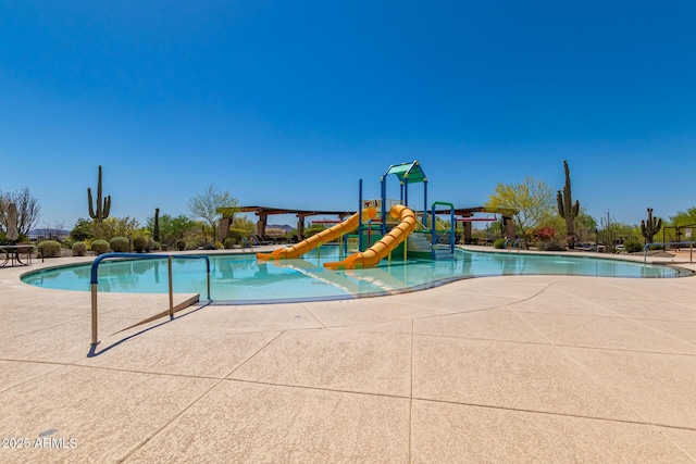 1951 W Plum Rd, Phoenix, AZ 85085 - community pool with a water play area, a water slide, and a patio area