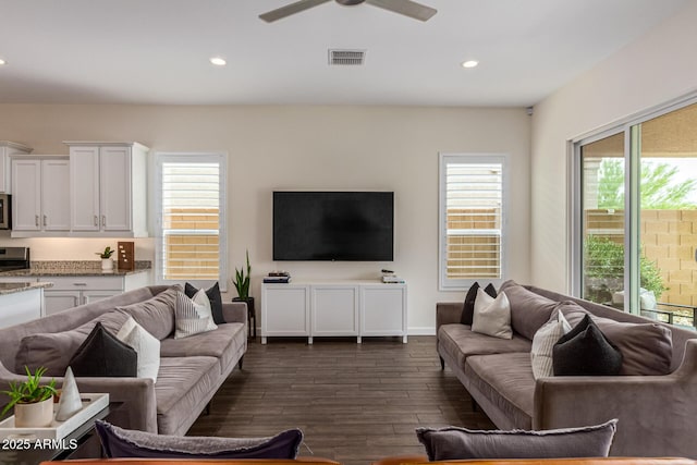 1951 W Plum Rd, Phoenix, AZ 85085 - living room with dark wood-style flooring, a ceiling fan, and recessed lighting