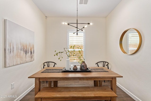 1951 W Plum Rd, Phoenix, AZ 85085 - dining space with a chandelier, baseboards, dark wood-style floors, and a desk