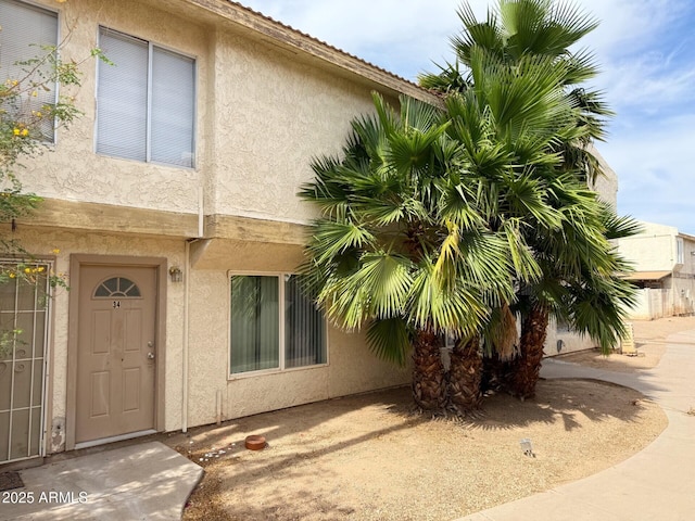 3840 N 43rd Ave Unit 34, Phoenix, AZ 85031 - view of exterior entry with stucco siding