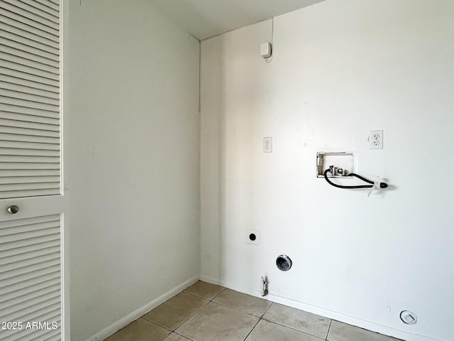 3840 N 43rd Ave Unit 34, Phoenix, AZ 85031 - washroom featuring gas dryer hookup, electric dryer hookup, hookup for a washing machine, light tile patterned floors, and baseboards