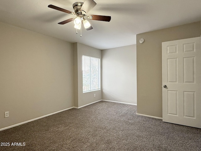 3840 N 43rd Ave Unit 34, Phoenix, AZ 85031 - carpeted spare room with ceiling fan, baseboards, and a smoke detector