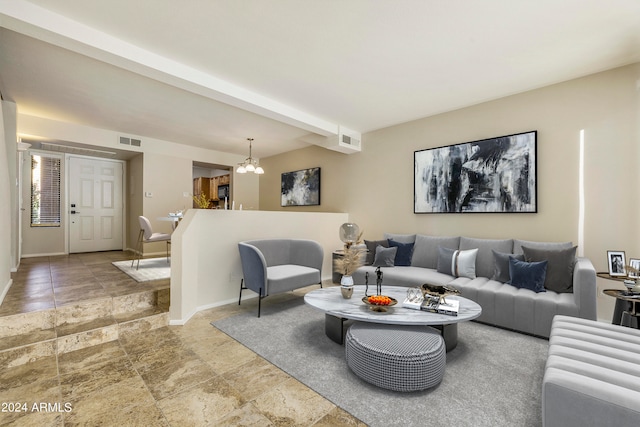 living room featuring an inviting chandelier