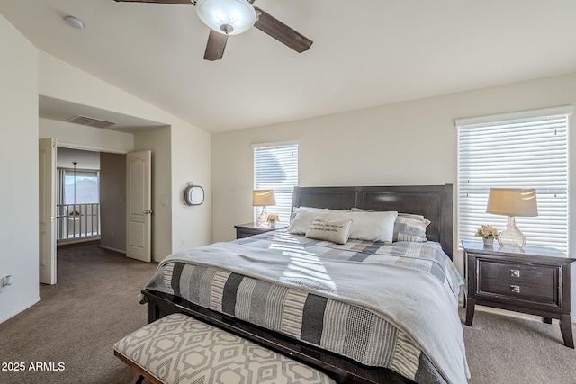 bedroom featuring ceiling fan, carpet, and lofted ceiling