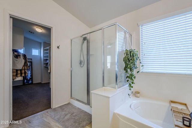 bathroom with plus walk in shower and lofted ceiling