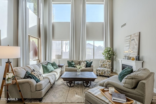 living room with a high ceiling