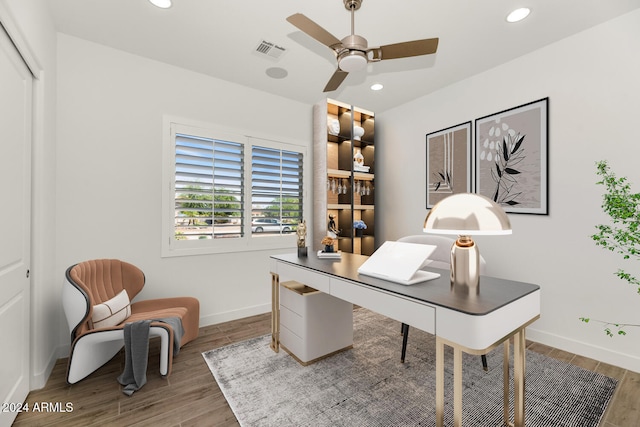 home office featuring ceiling fan, wood finished floors, and recessed lighting