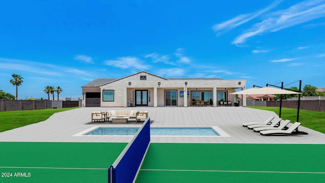 rear view of house with a fenced backyard, outdoor lounge area, a yard, french doors, and a fenced in pool