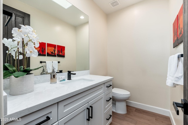 28768 N 95th Way, Scottsdale, AZ 85262 - bathroom featuring wood finished floors, vanity, and recessed lighting