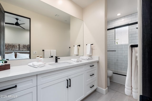 28768 N 95th Way, Scottsdale, AZ 85262 - ensuite bathroom featuring vanity, a ceiling fan, a tile shower, and tile patterned floors