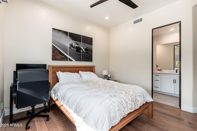 28768 N 95th Way, Scottsdale, AZ 85262 - bedroom featuring wood finished floors, recessed lighting, ensuite bath, and ceiling fan