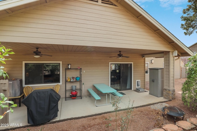 back of house with a patio area and a ceiling fan