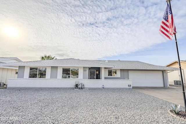 ranch-style home with a garage