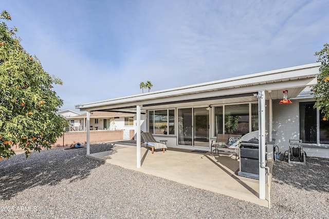 rear view of house featuring a patio area