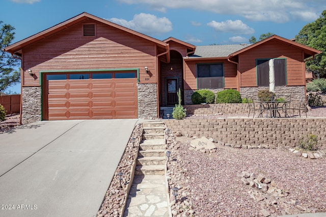 view of front of property with a garage