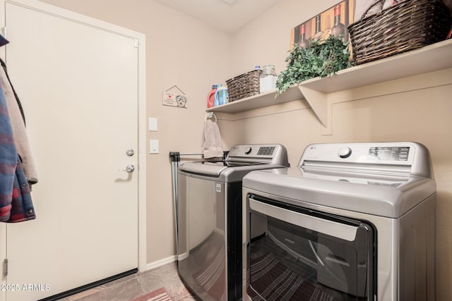 washroom featuring separate washer and dryer