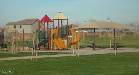 view of play area with a yard