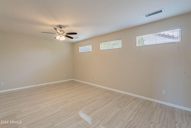 empty room with ceiling fan