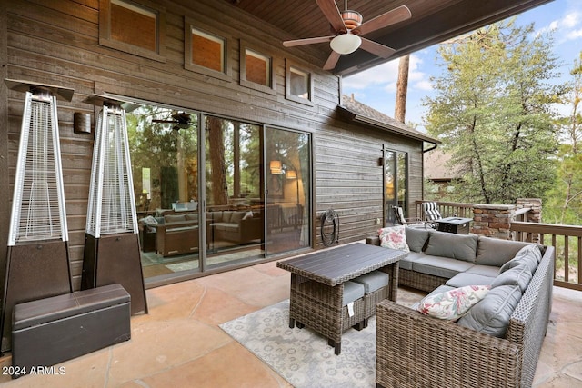 view of patio with ceiling fan and an outdoor hangout area