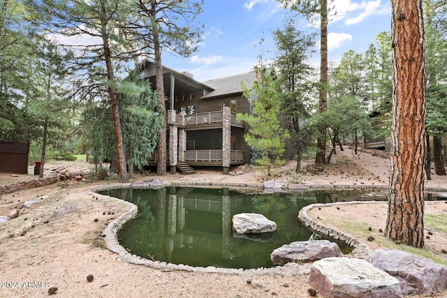 exterior space featuring a small pond