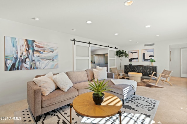 tiled living room with a barn door