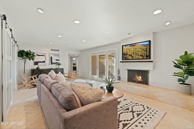 tiled living room with a barn door