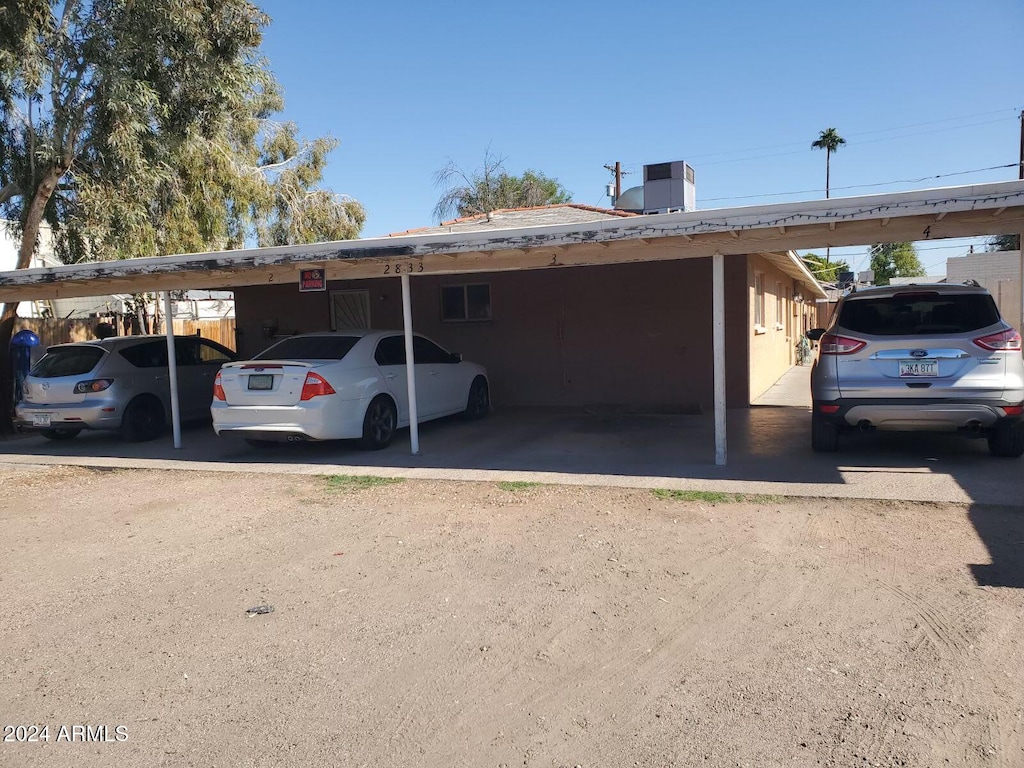 view of car parking with a carport